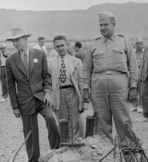 J. Robert Oppenheimer, William L. Laurence and Gen. Leslie Groves at Trinity ground zero, September 9, 1945
